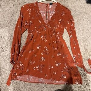 Burnt orange dress with white flowers